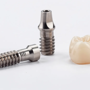 tooth and screws for dental implant.png